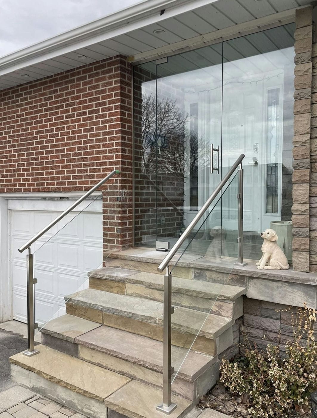 glass porch enclosure with stainless steel railings