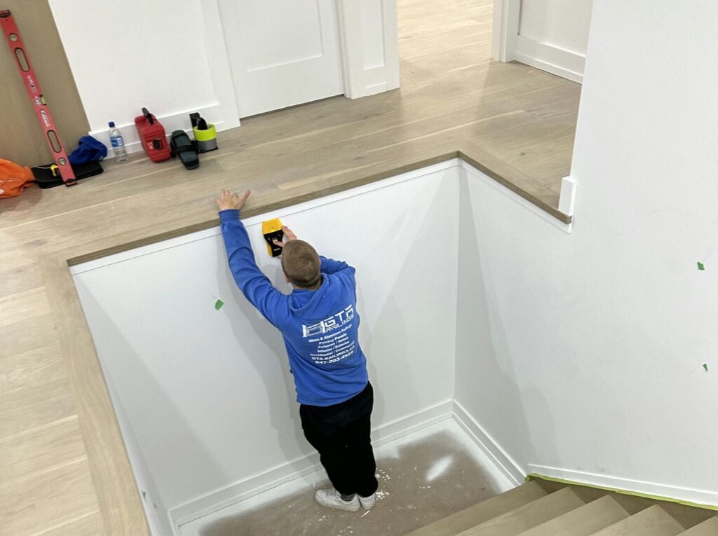 gta glass railings installer finding stud for railing hardware installation