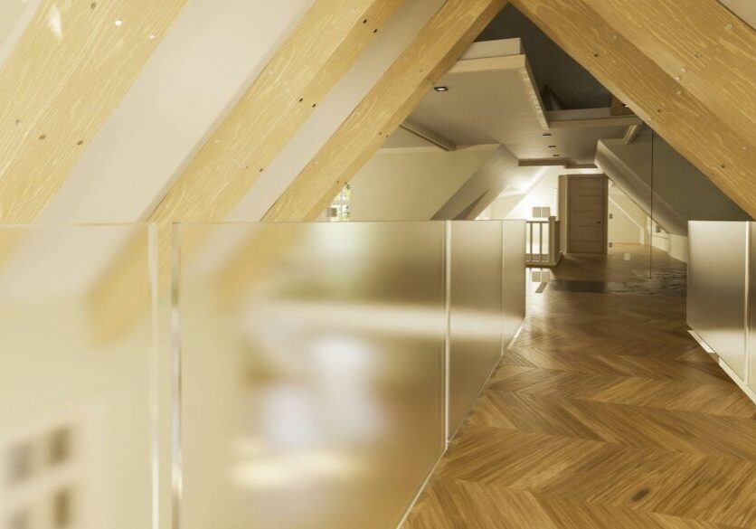 freshly installed frosted glass railings in upper level of home